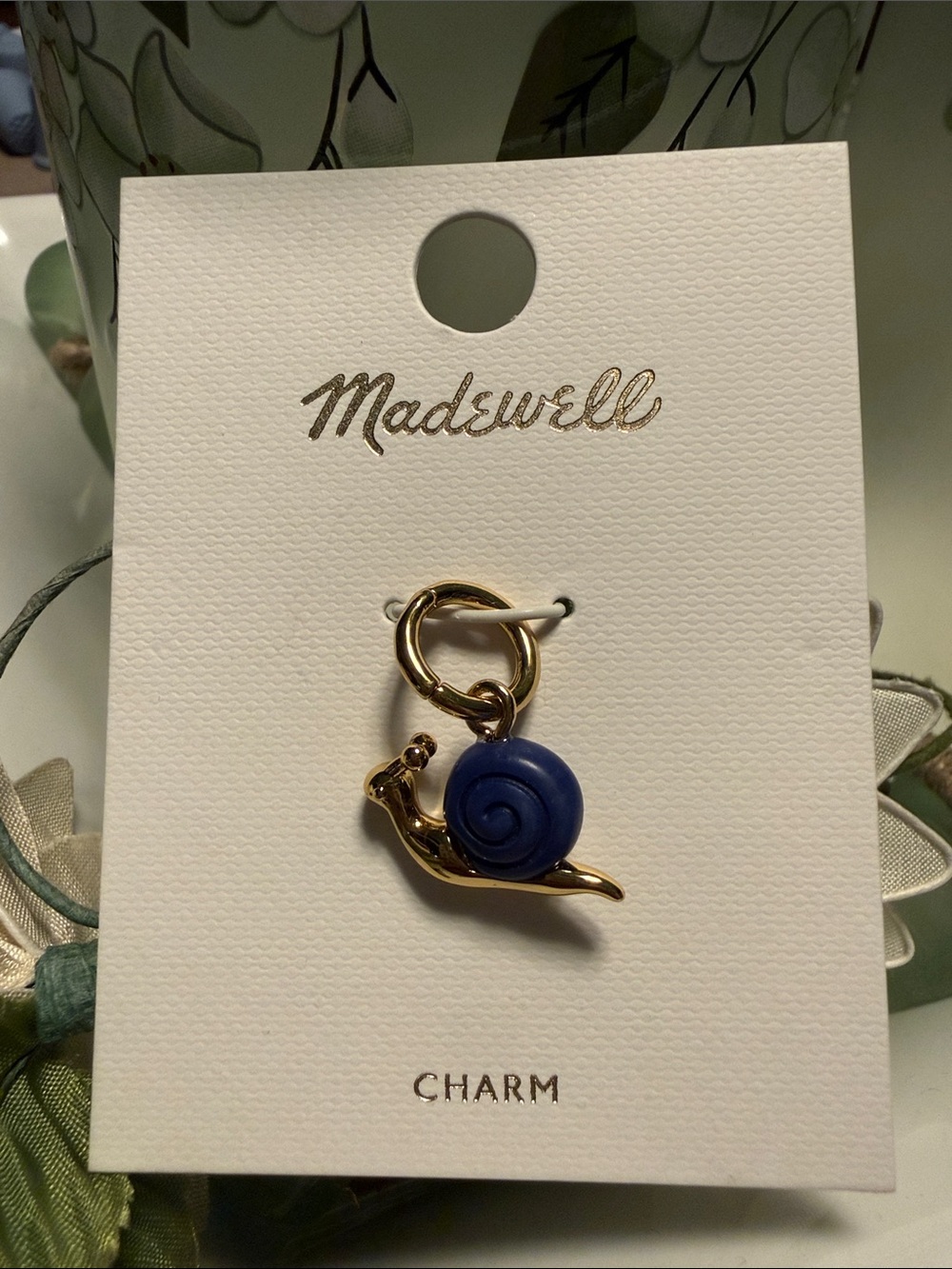 Madewell Gold tone Snail Charm with Blue Stone